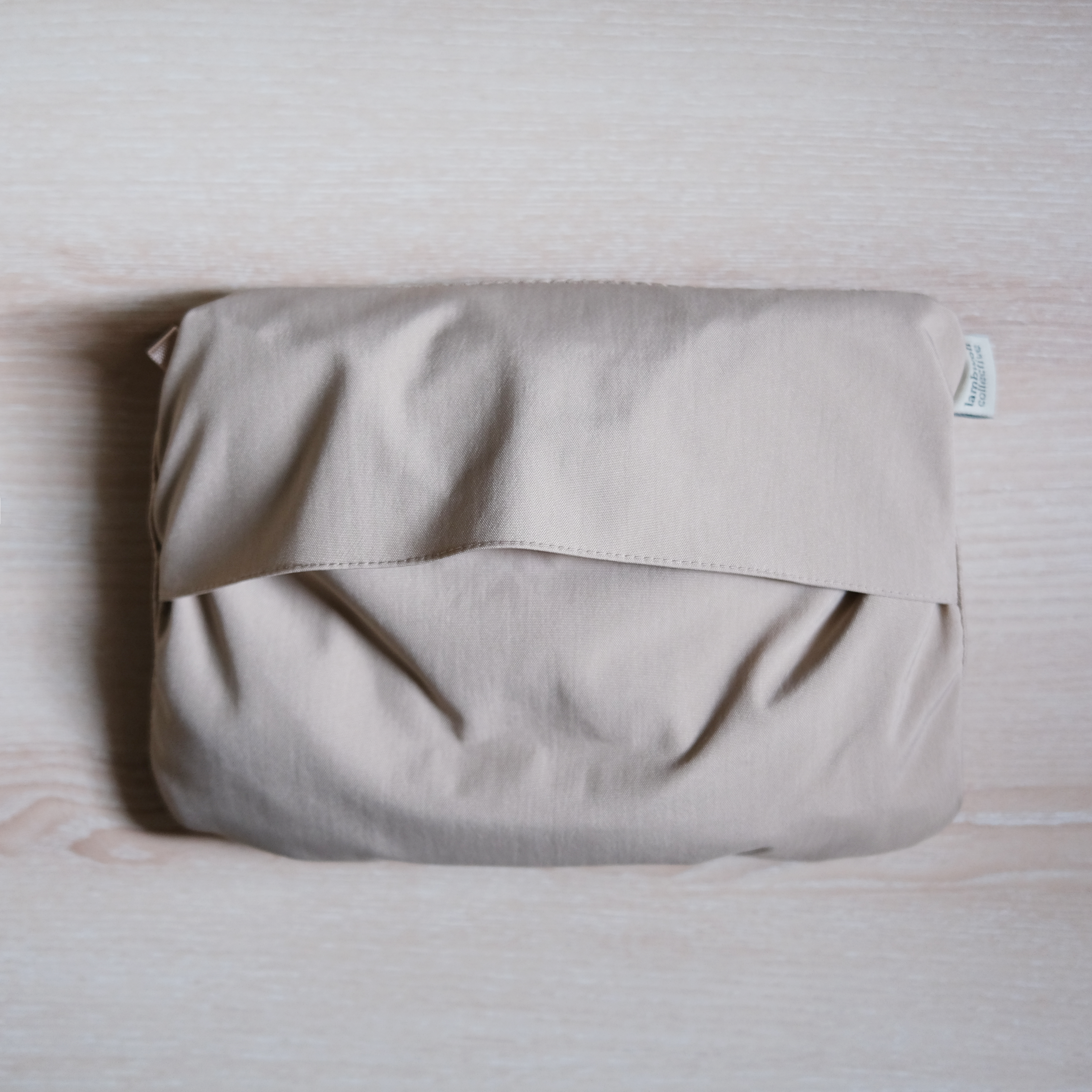 caption_pack entire coat into built in pouch